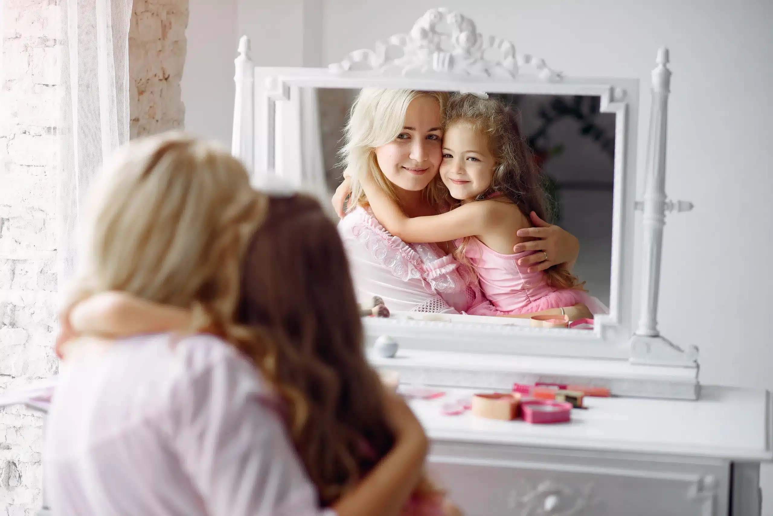 mother daughter gather morning front mirror scaled