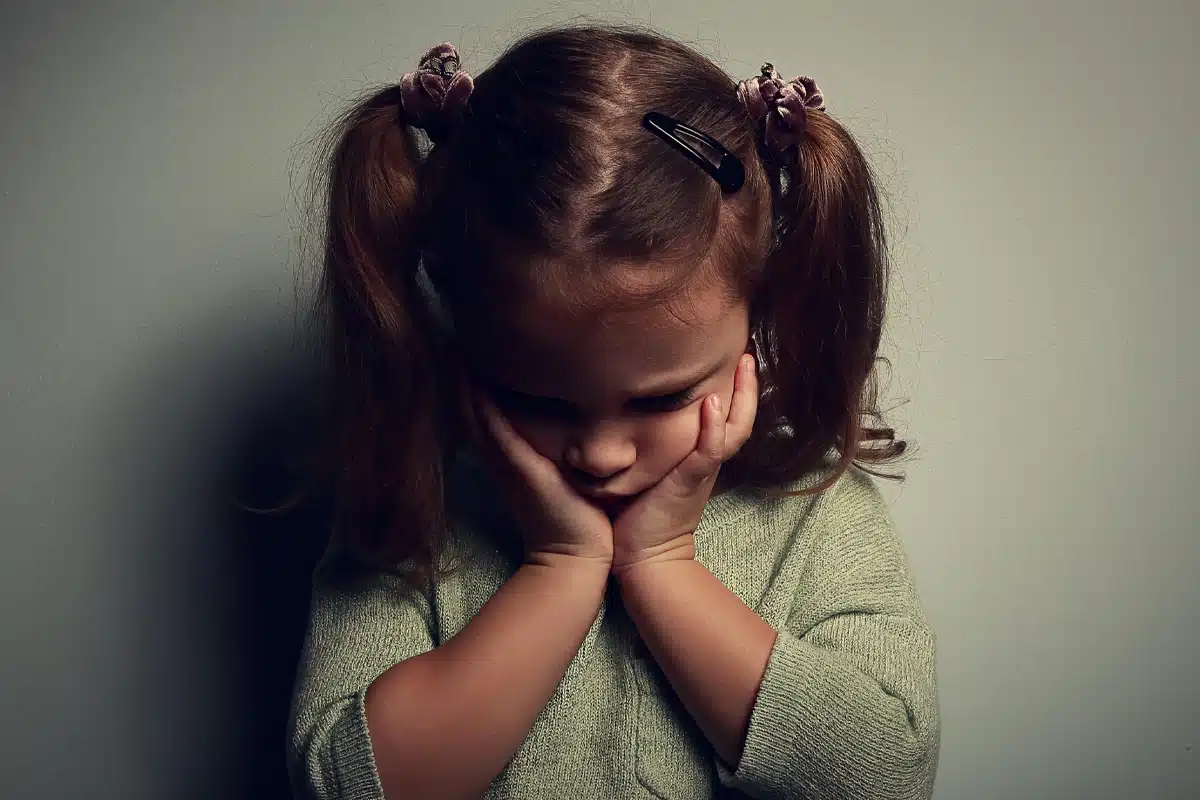 little girl sad